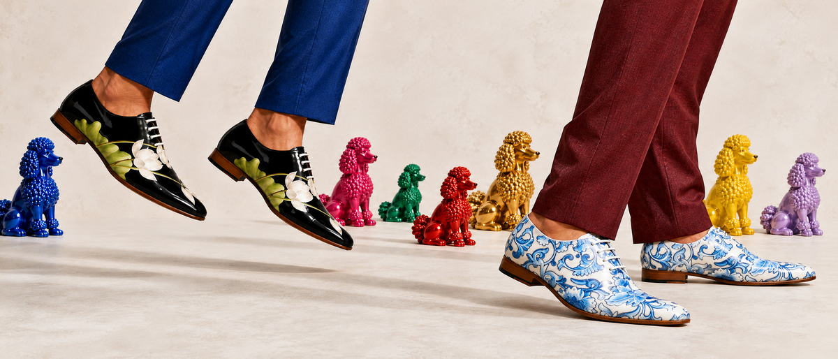 Artistic Alvin banner with two pairs of shoes and colourful dog sculptures